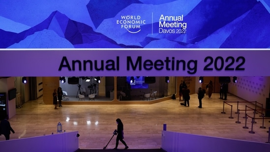 An employee vacuums inside the Congress Center ahead of the World Economic Forum (WEF) in Davos, Switzerland, on Sunday. The annual Davos gathering of political leaders, top executives and celebrities runs from May 22 to 26.(Bloomberg)