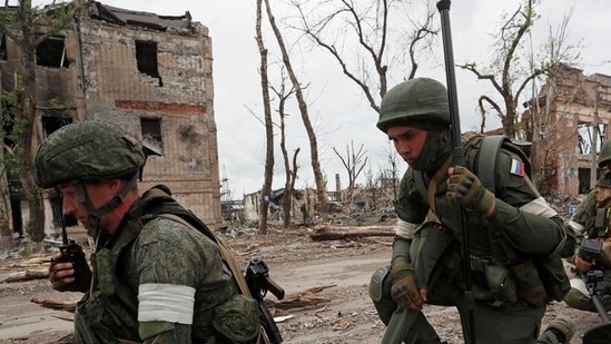 Russian service members work on demining the territory of Azovstal steel plant during Ukraine-Russia conflict in the southern port city of Mariupol, on May 22, 2022. (REUTERS)