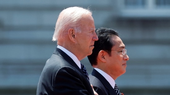 Japan's Prime Minister Fumio Kishida welcomes US President Joe Biden at Akasaka Palace in Tokyo, on May 23, 2022.&nbsp;(REUTERS)