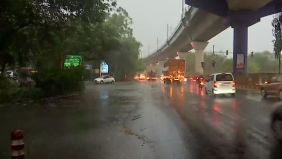Several parts of the national capital and the NCR received heavy rain with thunderstorms.(ANI)