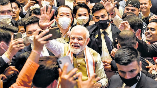 Prime Minister Narendra Modi greeted by members of the Indian community in Tokyo on Monday (PTI)