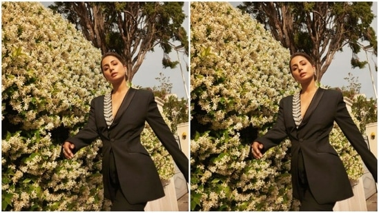 Hina wore her tresses into a bun and decked up in nude eyeshadow, mascara-laden eyelashes, black kohl, drawn eyebrows, contoured cheeks and a shade of nude lipstick.(Instagram/@realhinakhan)