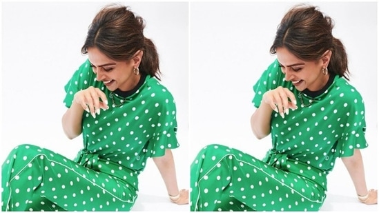 Deepika played muse to fashion designer house Louis Vuitton and picked a bright jumpsuit for the red-carpet look.(Instagram/@deepikapadukone)