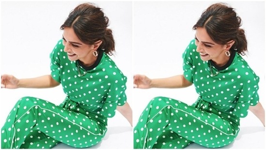 In silver hoop earrings, white painted nails and white stilettos, Deepika posed for the pictures.(Instagram/@deepikapadukone)