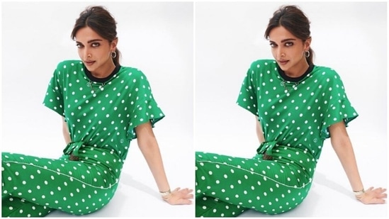 Deepika wore her tresses into a messy bun with a middle part as she posed like a diva.(Instagram/@deepikapadukone)