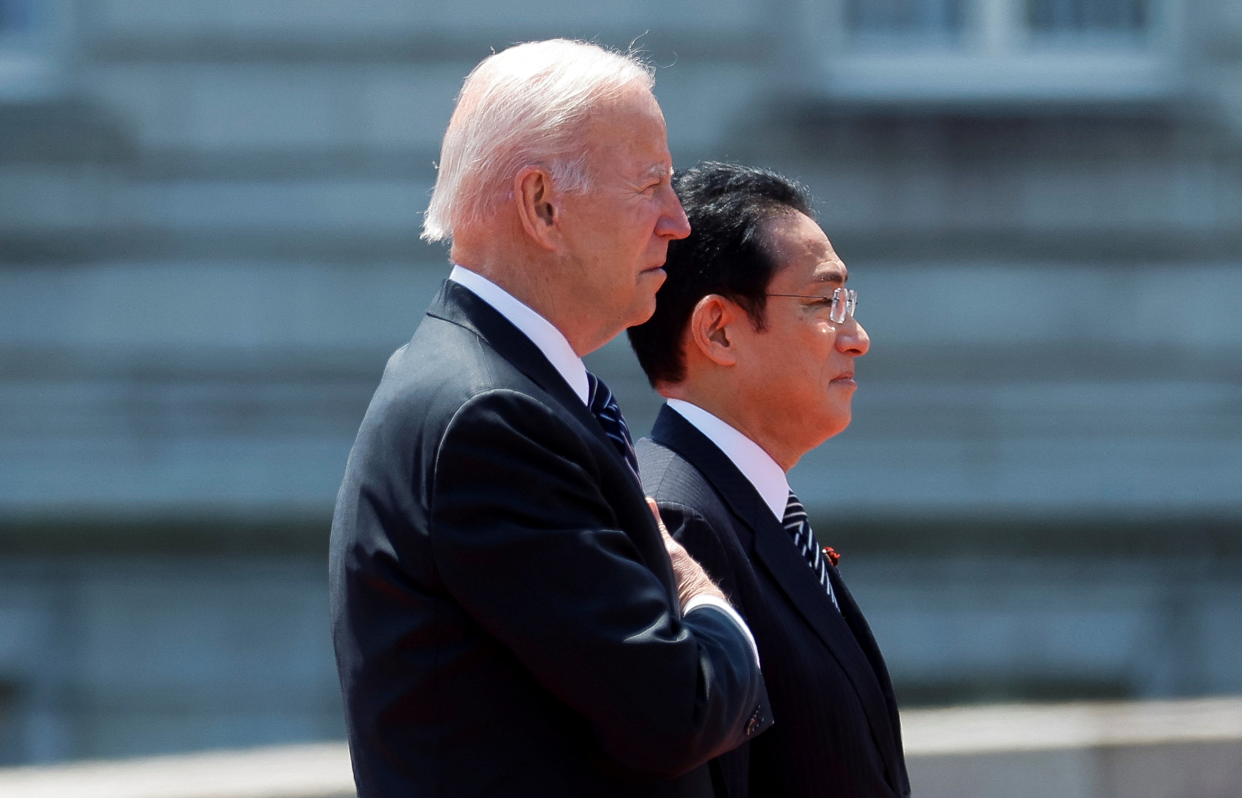 Japan's Prime Minister Fumio Kishida welcomes US President Joe Biden at Akasaka Palace in Tokyo, on May 23, 2022.&nbsp; (REUTERS)