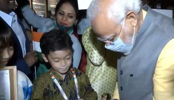 Prime Minister Narendra Modi interacts with Japanese student Wizuki in Tokyo, (Twitter/ANI)