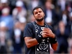 France's Jo-Wilfried Tsonga reacts after playing his final match before retiring, after losing his first round match against Norway's Casper Ruud(REUTERS)