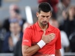 Serbia's Novak Djokovic celebrates after winning his first round match against Japan's Yoshihito Nishioka
