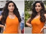 Nora Fatehi cuts a flattering silhouette in orange bodycon dress for Dance Deewane Juniors shoot Nora Fatehi cuts a flattering silhouette in orange bodycon dress for Dance Deewane Juniors shoot