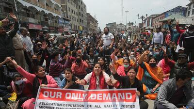 Members of Kashmiri Pandit community during a protest following the recent killing of government employee Rahul Bhat, in Srinagar, Jammu and Kashmir. (Waseem Andrabi/HT) Members of Kashmiri Pandit community during a protest following the recent killing of government employee Rahul Bhat, in Srinagar, Jammu and Kashmir. (Waseem Andrabi/HT)
