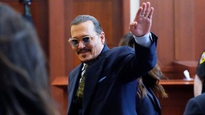 Johnny Depp gestures to the gallery in the courtroom as he leaves for the day at the Fairfax County Circuit Courthouse on Monday. (AP) (AP) Johnny Depp gestures to the gallery in the courtroom as he leaves for the day at the Fairfax County Circuit Courthouse on Monday. (AP) (AP)