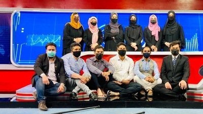 Afghan male TV presenters also cover their faces in solidarity with their female colleagues. (Image courtesy: @HSajwanization) Afghan male TV presenters also cover their faces in solidarity with their female colleagues. (Image courtesy: @HSajwanization)