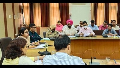 Deputy commissioner Surabhi Malik addressing a high-level meeting at Bachat Bhawan in Ludhiana on Tuesday. (HT Photo)