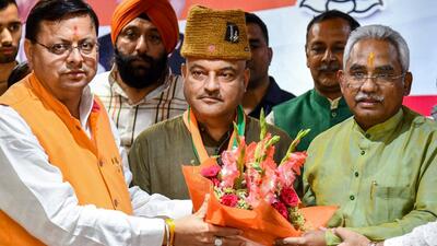 Uttarakhand chief minister Pushkar Singh Dhami and state BJP president Madan Kaushik welcome former AAP leader Col Ajay Kothiyal (retd) to the BJP in Dehradun (PTI) Uttarakhand chief minister Pushkar Singh Dhami and state BJP president Madan Kaushik welcome former AAP leader Col Ajay Kothiyal (retd) to the BJP in Dehradun (PTI)