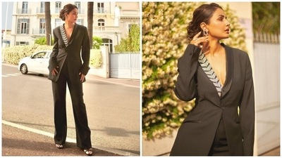On Monday, Hina left the internet swooning as she channelled her inner boss lady dressed in a black embellished shirtless powersuit. The star's ensemble featured a blazer with sequinned lapels teamed with straight-fit high-rise pants. A sleek bun, diamond jewellery, stilettos, nude lip shade, glowing skin, blushed cheeks and shimmery eye shadow rounded it off for Hina. (Instagram) On Monday, Hina left the internet swooning as she channelled her inner boss lady dressed in a black embellished shirtless powersuit. The star's ensemble featured a blazer with sequinned lapels teamed with straight-fit high-rise pants. A sleek bun, diamond jewellery, stilettos, nude lip shade, glowing skin, blushed cheeks and shimmery eye shadow rounded it off for Hina. (Instagram)