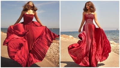 These pictures show Hina's first get up after arriving in Cannes. She wore a red strapless dress decked with pleated details and a fit and flared silhouette. Many fashion enthusiasts called this look a promising start. (Instagram) These pictures show Hina's first get up after arriving in Cannes. She wore a red strapless dress decked with pleated details and a fit and flared silhouette. Many fashion enthusiasts called this look a promising start. (Instagram)