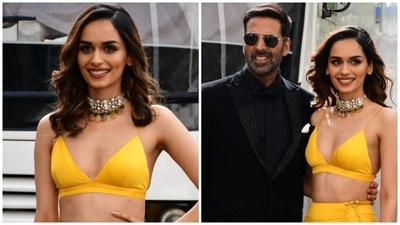 Manushi Chhillar and Akshay Kumar have kickstarted the promotions of their much-anticipated upcoming film Prithviraj. The two actors stepped out in Mumbai yesterday dressed in stunning ensembles for the occasion. While Manushi chose a lehenga and bralette set, Akshay wore a black tuxedo. Pictures and videos of the two stars' outing have gone viral on social media. (HT Photo/Varinder Chawla) Manushi Chhillar and Akshay Kumar have kickstarted the promotions of their much-anticipated upcoming film Prithviraj. The two actors stepped out in Mumbai yesterday dressed in stunning ensembles for the occasion. While Manushi chose a lehenga and bralette set, Akshay wore a black tuxedo. Pictures and videos of the two stars' outing have gone viral on social media. (HT Photo/Varinder Chawla)