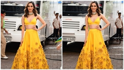 Manushi's ethnic look comes in a summer-ready bright yellow shade to beat the heat in style. It features a silk satin bralette with a plunging V neckline, thin straps to hold the top, a midriff-baring hem and backless detail. (HT Photo/Varinder Chawla) Manushi's ethnic look comes in a summer-ready bright yellow shade to beat the heat in style. It features a silk satin bralette with a plunging V neckline, thin straps to hold the top, a midriff-baring hem and backless detail. (HT Photo/Varinder Chawla)