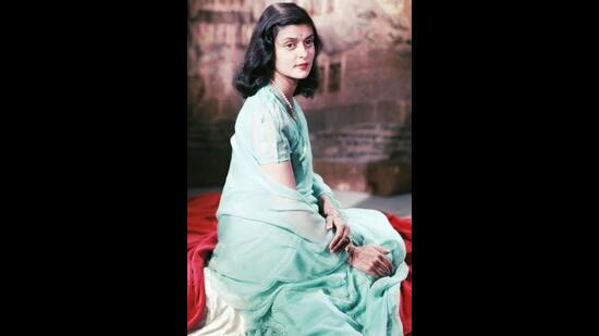 Maharani Gayatri Devi in a delicate blue pastel chiffon saree with matching pearl jewellery uh (Photo: Twitter)