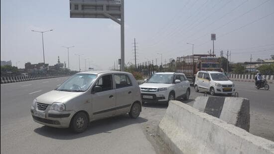 Vehicles pass through a undesignated exit on Delhi Meerut Expressway on Tuesday. (Sakib Ali/ HT)