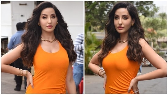 Nora Fatehi cuts a flattering silhouette in orange bodycon dress for Dance Deewane Juniors shoot(HT Photo/Varinder Chawla)