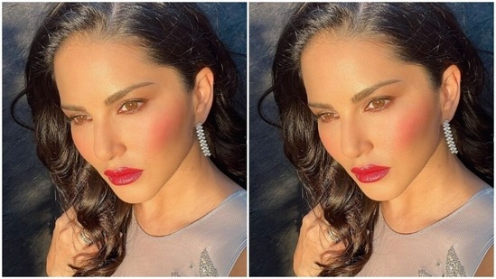 Assisted by makeup artist Kin Vanity, Sunny decked up in mascara-laden eyelashes, blush cheeks, contoured face and a shade of bright red lipstick.(Instagram/@sunnyleone)