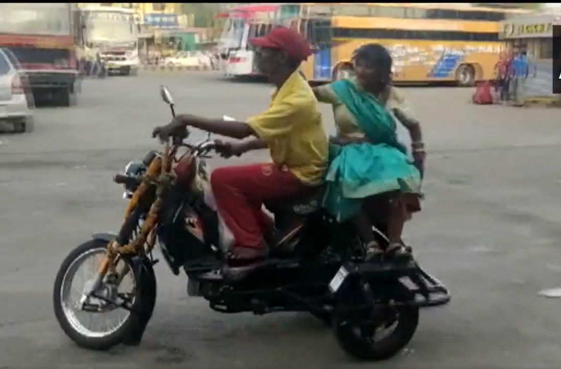 Santosh Kumar Sahu and his wife Munni on their new vehicle. (ANI) Santosh Kumar Sahu and his wife Munni on their new vehicle. (ANI)