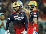 Kolkata: Virat Kohli and Rajat Patidar of Royal Challengers Bangalore during the Indian Premier League 2022 Eliminator match between Lucknow Super Giants and Royal Challengers Bangalore, at Eden Gardens in Kolkata, Wednesday, May 25, 2022. (Sportzpics for IPL/PTI Photo)(PTI05_25_2022_000212A)(PTI)