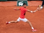 The top-ranked Djokovic defeated the 24-year-old Slovakian 6-2, 6-3, 7-6 (4) at Court Suzanne Lenglen.