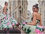 Deepika Padukone in a floral dress, all decked up of the day.