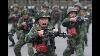 FILE - In this photo taken on April 22, 2013, new recruits practice charging with bayonets at a military training center in Hsinchu County, northern Taiwan. (AP) FILE - In this photo taken on April 22, 2013, new recruits practice charging with bayonets at a military training center in Hsinchu County, northern Taiwan. (AP)