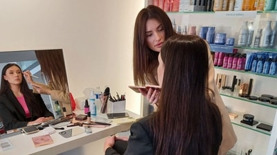 Ukrainian makeup artist Aliona Antonova (R) applies make-up on a model at a salon in Cannes, southern France, on the sidelines of the 75th edition of the Cannes Film Festival, on May 22, 2022. (AFP) Ukrainian makeup artist Aliona Antonova (R) applies make-up on a model at a salon in Cannes, southern France, on the sidelines of the 75th edition of the Cannes Film Festival, on May 22, 2022. (AFP)