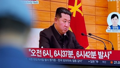 A TV screen shows a news program reporting about North Korea's missile launch with a file footage of North Korean leader Kim Jong Un, at a train station in Seoul, South Korea, Wednesday. (AP) A TV screen shows a news program reporting about North Korea's missile launch with a file footage of North Korean leader Kim Jong Un, at a train station in Seoul, South Korea, Wednesday. (AP)