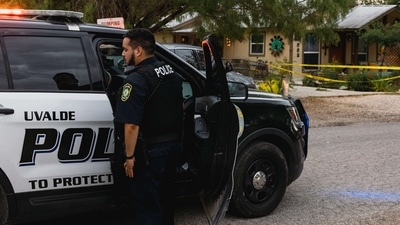 Uvalde Police gather outside the home of suspected gunman 18-year-old Salvador Ramos on May 24, 2022 in Uvalde, Texas. Jordan Vonderhaar/Getty Images/AFP (AFP) Uvalde Police gather outside the home of suspected gunman 18-year-old Salvador Ramos on May 24, 2022 in Uvalde, Texas. Jordan Vonderhaar/Getty Images/AFP (AFP)