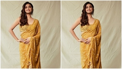 Styled by fashion stylist Archa Mehta, Keerthy wore her tresses open in wavy curls and a side part. (Instagram/@keerthysureshofficial)