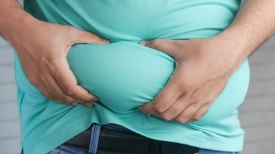 Visceral body fat, is the fat that gets stored inside the belly and surrounds all the vital organs like liver, pancreas, intestines etc. The fat stored underneath the skin is known as subcutaneous fat. “As Indians, we have an increased tendency to have central obesity”, says Dr. Aparna Govil Bhasker, a bariatric surgeon at Mumbai's Saifee Hospital. A typical Indian person walking on the road will be thin all over except for a protruding paunch. This is also known as apple shaped body or android obesity. Excess abdominal fat or visceral fat is an independent predictor of risk factors for diseases like type 2 diabetes, high blood pressure, dyslipidemia, and other components of the metabolic syndrome. (Photo by Towfiqu barbhuiya on Unsplash) Visceral body fat, is the fat that gets stored inside the belly and surrounds all the vital organs like liver, pancreas, intestines etc. The fat stored underneath the skin is known as subcutaneous fat. “As Indians, we have an increased tendency to have central obesity”, says Dr. Aparna Govil Bhasker, a bariatric surgeon at Mumbai's Saifee Hospital. A typical Indian person walking on the road will be thin all over except for a protruding paunch. This is also known as apple shaped body or android obesity. Excess abdominal fat or visceral fat is an independent predictor of risk factors for diseases like type 2 diabetes, high blood pressure, dyslipidemia, and other components of the metabolic syndrome. (Photo by Towfiqu barbhuiya on Unsplash)