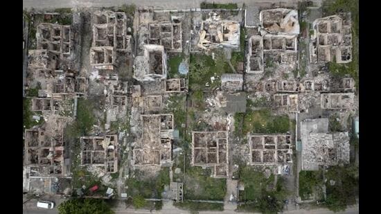 An aerial view of a residential area ruined by the Russian shelling in Irpin close to Kyiv, Ukraine on Saturday, May 21, 2022. (Efrem Lukatsky/AP)