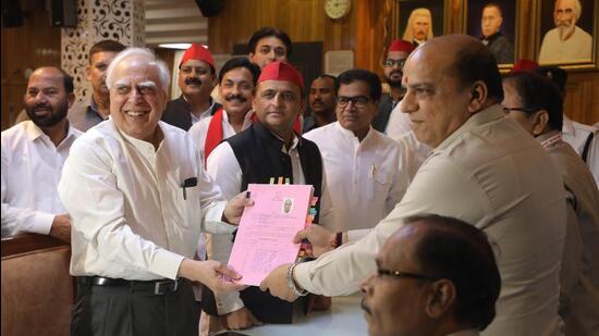 Lucknow, India - May 25, 2022: Former Congress leader Kapil Sibal files his nomination for Rajya Sabha seat in presence of Samajwadi Party president Akhilesh Yadav, at Vidhan Bhavan, in Lucknow, Uttar Pradesh, India, on Wednesday, May 25, 2022. (Photo by Deepak Gupta/Hindustan Times) Lucknow, India - May 25, 2022: Former Congress leader Kapil Sibal files his nomination for Rajya Sabha seat in presence of Samajwadi Party president Akhilesh Yadav, at Vidhan Bhavan, in Lucknow, Uttar Pradesh, India, on Wednesday, May 25, 2022. (Photo by Deepak Gupta/Hindustan Times)