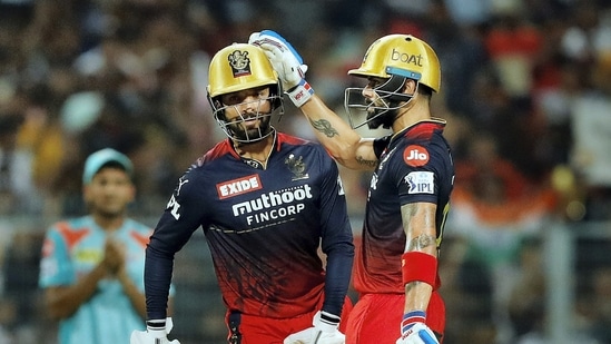 Kolkata: Virat Kohli and Rajat Patidar of Royal Challengers Bangalore during the Indian Premier League 2022 Eliminator match between Lucknow Super Giants and Royal Challengers Bangalore, at Eden Gardens in Kolkata, Wednesday, May 25, 2022. (Sportzpics for IPL/PTI Photo)(PTI05_25_2022_000212A)(PTI)