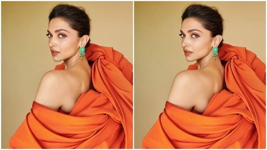 Deepika picked an orange gown for the red carpet. She decked up in it and posed for both outdoor and indoor photoshoot.(Instagram/@deepikapadukone)