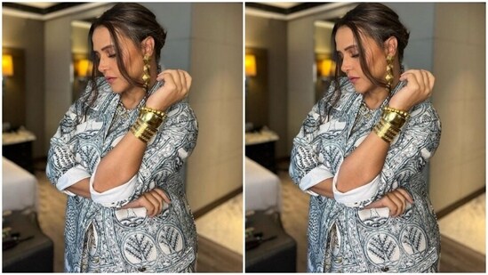 The quarter sleeved blazer featured lapel collars and white cuffs. In gold danglers and bracelets from Tribe Amrapali, she further accessorised her look.(Instagram/@nehadhupia)