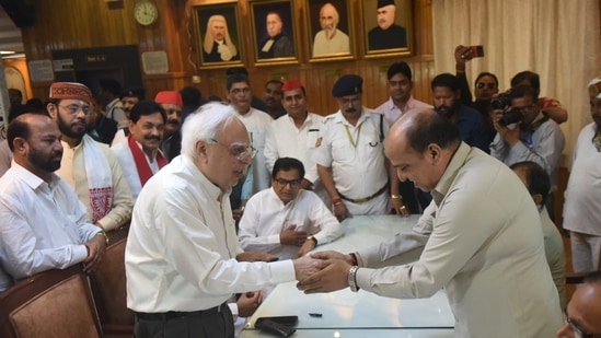 Kapil Sibal submitting his Rajya Sabha nomination with SP support on Wednesday. (Photo: Deepak Gupta)