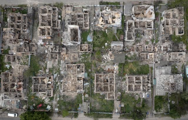 An aerial view of a residential area ruined by the Russian shelling in Irpin close to Kyiv, Ukraine on Saturday, May 21, 2022. (Efrem Lukatsky/AP) An aerial view of a residential area ruined by the Russian shelling in Irpin close to Kyiv, Ukraine on Saturday, May 21, 2022. (Efrem Lukatsky/AP)