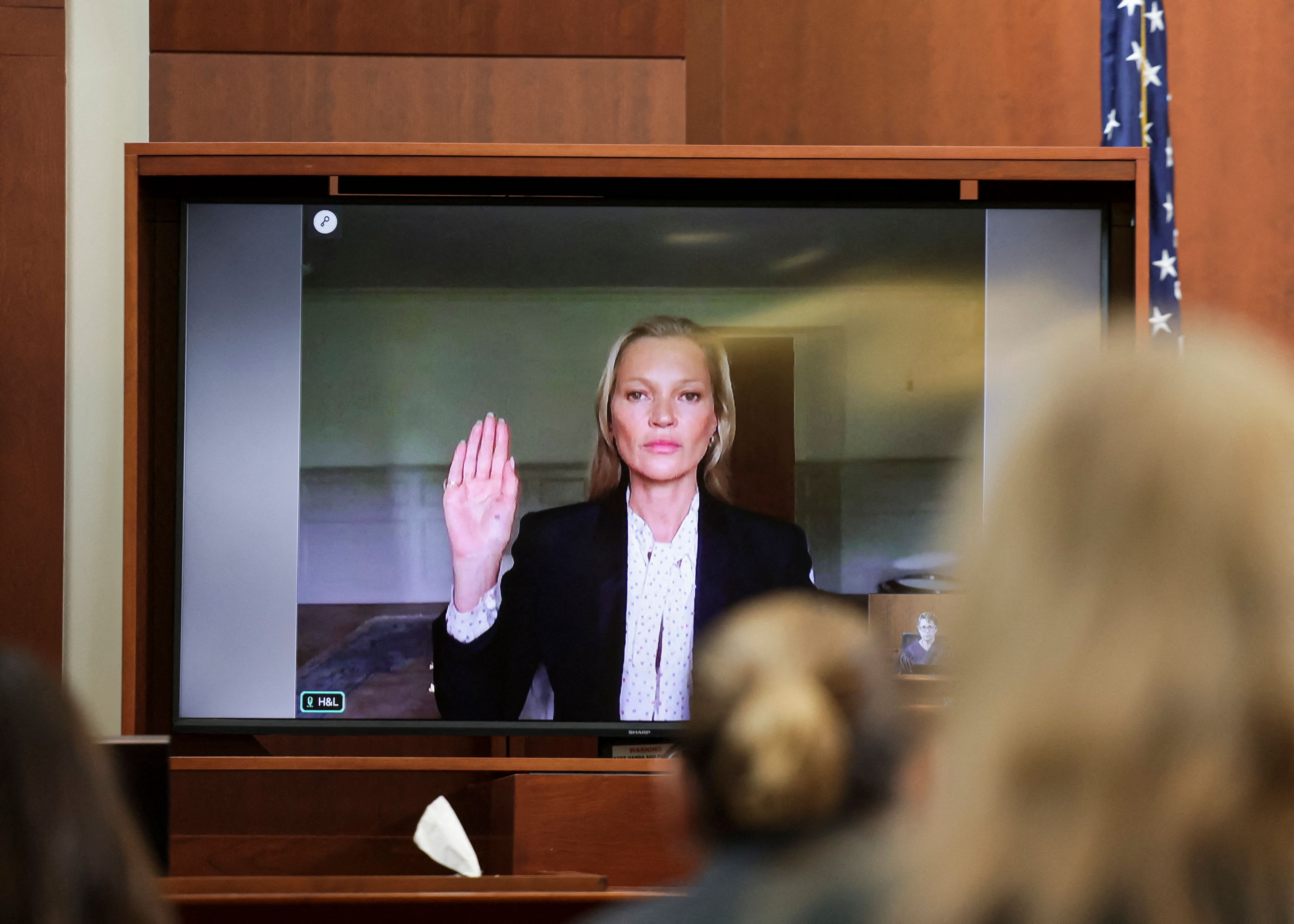 TOPSHOT - Model Kate Moss is sworn in via video link at the Fairfax County Circuit Courthouse in Fairfax, Virginia, on May 25, 2022. - Actor Johnny Depp is suing ex-wife Amber Heard for libel after she wrote an op-ed piece in The Washington Post in 2018 referring to herself as a �public figure representing domestic abuse.� (Photo by EVELYN HOCKSTEIN / POOL / AFP) (AFP) TOPSHOT - Model Kate Moss is sworn in via video link at the Fairfax County Circuit Courthouse in Fairfax, Virginia, on May 25, 2022. - Actor Johnny Depp is suing ex-wife Amber Heard for libel after she wrote an op-ed piece in The Washington Post in 2018 referring to herself as a �public figure representing domestic abuse.� (Photo by EVELYN HOCKSTEIN / POOL / AFP) (AFP)