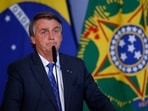 Brazil's President Jair Bolsonaro had not planned to attend the summit until Biden sent an envoy to convince him to come with the offer of a bilateral meeting.(AFP)