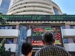 People watch the Sensex on a screen outside Bombay Stock Exchange (BSE) in Mumbai.(PTI) People watch the Sensex on a screen outside Bombay Stock Exchange (BSE) in Mumbai.(PTI)