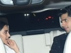 Kiara Advani and Sidharth Malhotra snapped leaving Karan Johar's party. Kiara Advani and Sidharth Malhotra snapped leaving Karan Johar's party.