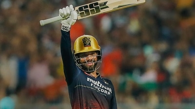 Rajat Patidar of Royal Challengers Bangalore raises his bat after scoring a century (PTI) Rajat Patidar of Royal Challengers Bangalore raises his bat after scoring a century (PTI)