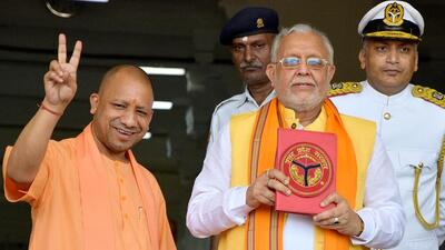 Uttar Pradesh finance minister Suresh Khanna along with chief minister Yogi Adityanath arrives to present the State Budget 2022-23 during the budget session of the state assembly, in Lucknow on Thursday. (ANI Photo) (Pramod Adhikari) Uttar Pradesh finance minister Suresh Khanna along with chief minister Yogi Adityanath arrives to present the State Budget 2022-23 during the budget session of the state assembly, in Lucknow on Thursday. (ANI Photo) (Pramod Adhikari)